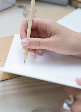 writing in a notebook